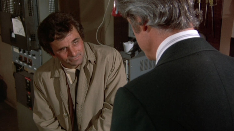 Columbo looks at the killer in a projection booth in "Double Exposure" (1973)