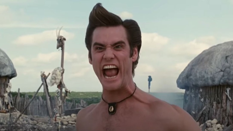 Ace Ventura yells shirtless