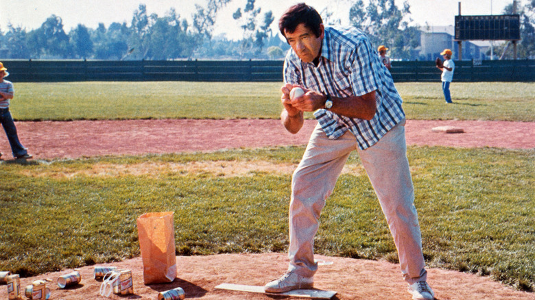 Walter Matthau holding baseball
