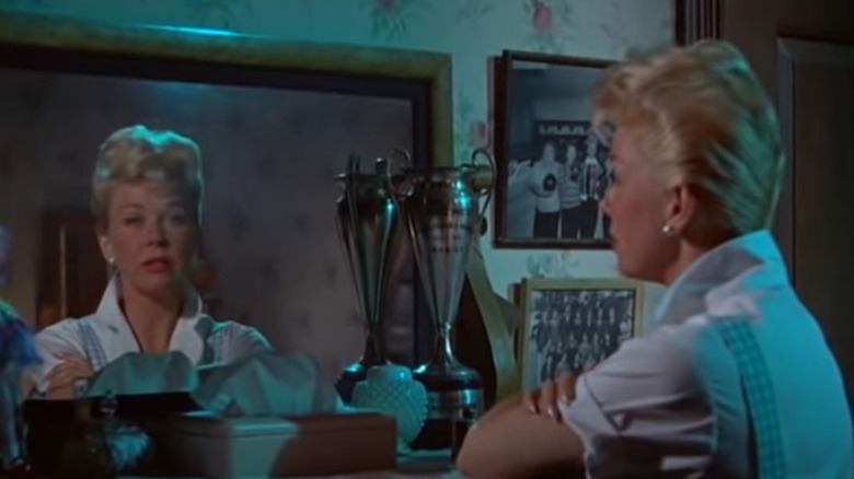 Doris Day looks in mirror