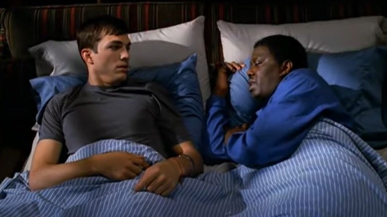 Ashton Kutcher and Bernie Mac in bed