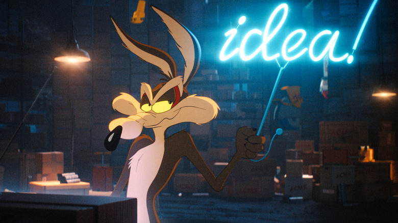 Wile E. Coyote lights up a neon sign reading "idea!" in "Coyote vs. Acme" (2026)