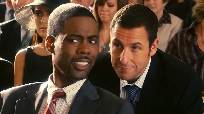 Chris Rock talking with Adam Sandler