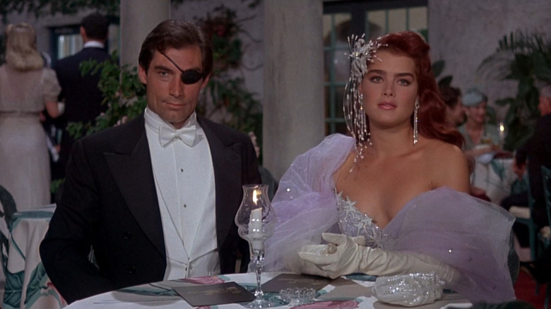 Basil St. John and Brenda Starr sit down for a fancy dinner in "Brenda Starr" (1992)