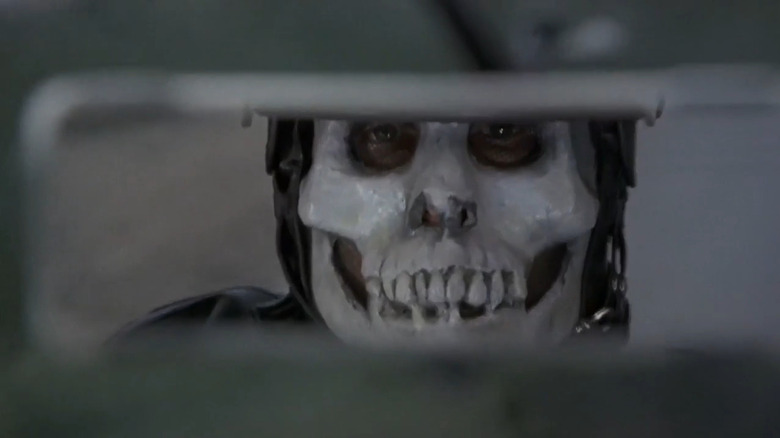 Skull-faced "Death" seen in a rearview mirror in "Tales from the Crypt" (1972)