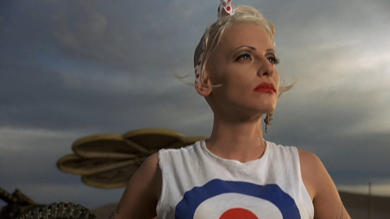 Tank Girl looks out at the horizon in "Tank Girl" (1995)