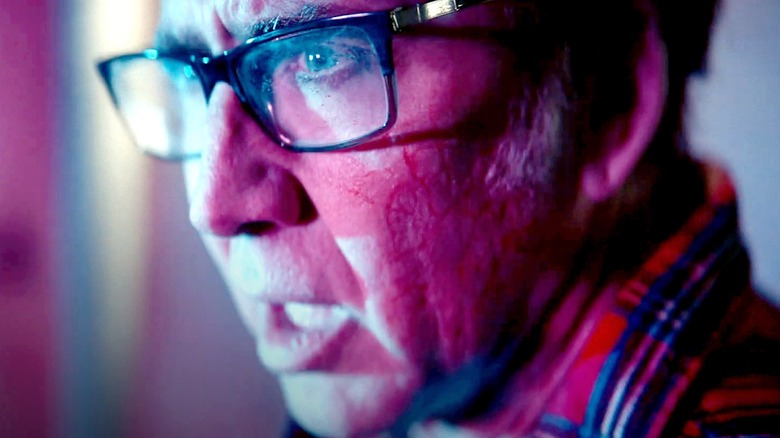 Nathan Gardner looking concerned and possessed in Color Out of Space (2019)