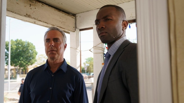 Harry Bosch and Jerry Edgar standing outside of a door in Bosch