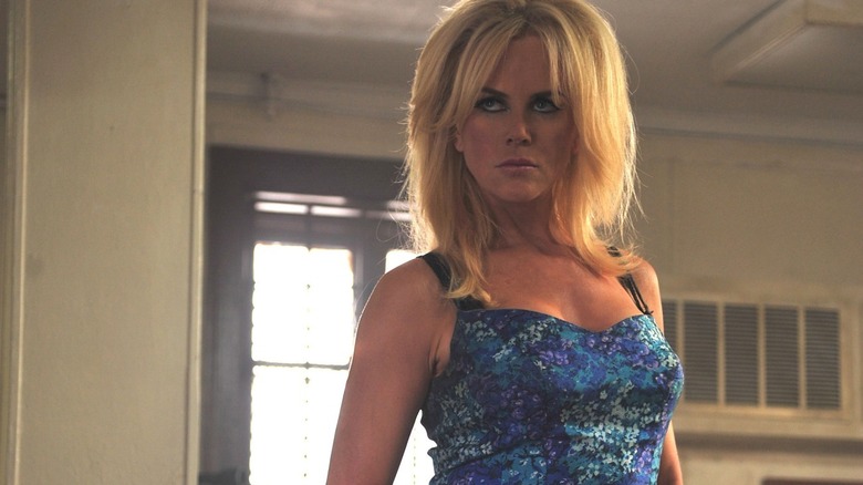 Charlotte Bless wears a blue summer dress