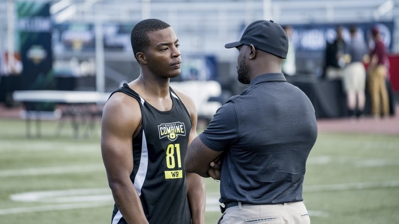 Spenser talks to his coach