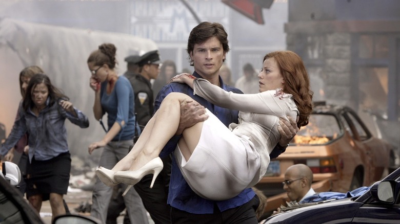 Clark carries wounded woman from wreck