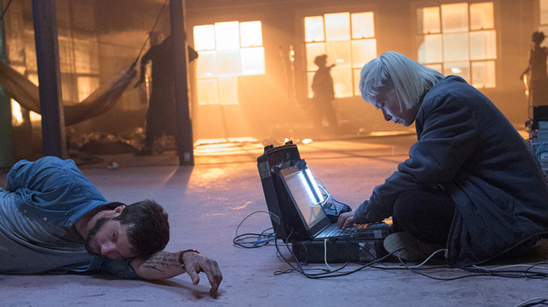 Grey Trace lays on the ground in "Upgrade" (2018)