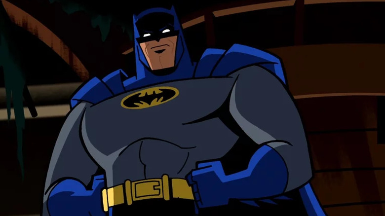 Batman stands with his hands on his hips on Batman: The Brave and the Bold (2008-2011)