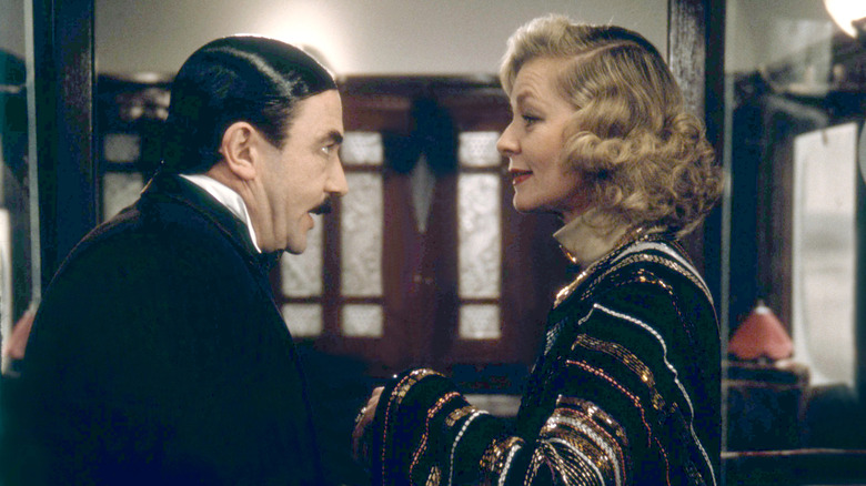 Hercule Poirot interrogates Mrs. Hubbard in "Murder on the Orient Express" (1974)