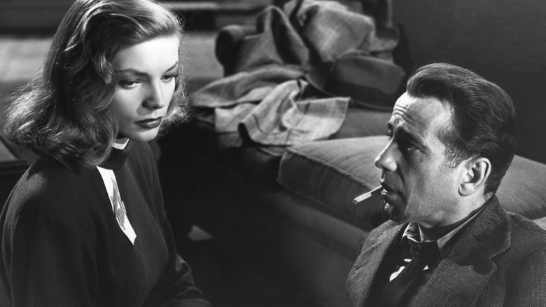 Vivian unties Philip Marlowe in "The Big Sleep" (1946)
