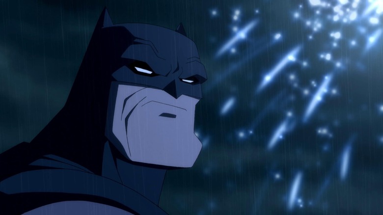 An older Batman standing outside in "Batman: The Dark Knight Returns"