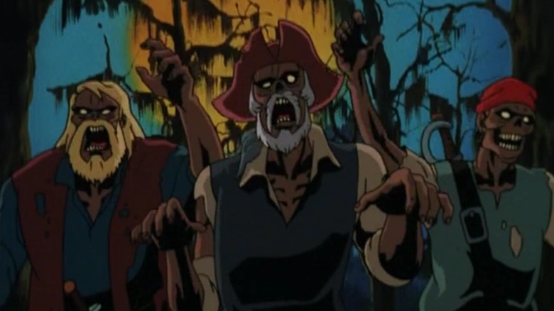 A group of zombies approaching from a swamp in "Scooby-Doo on Zombie Island"