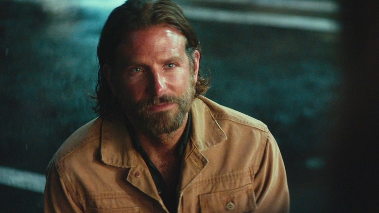 Jack sitting in the parking lot in "A Star Is Born"