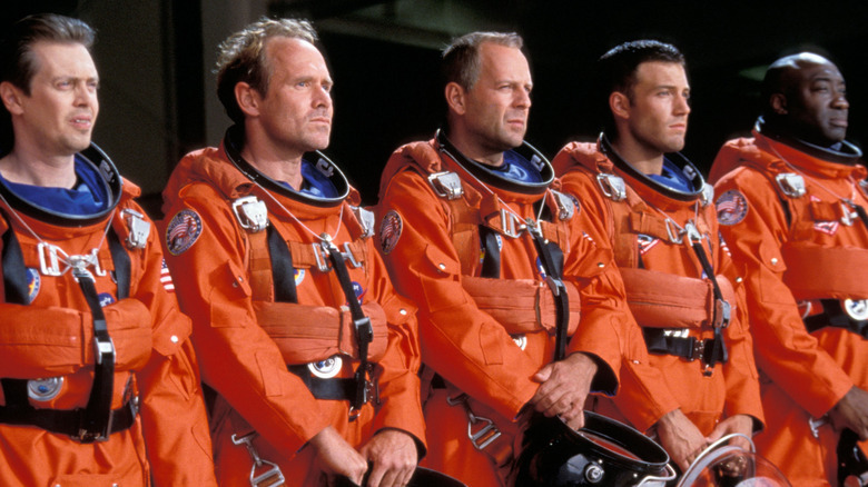 Rockhound, Chick, Harry, A.J., and Bear standing together in uniform