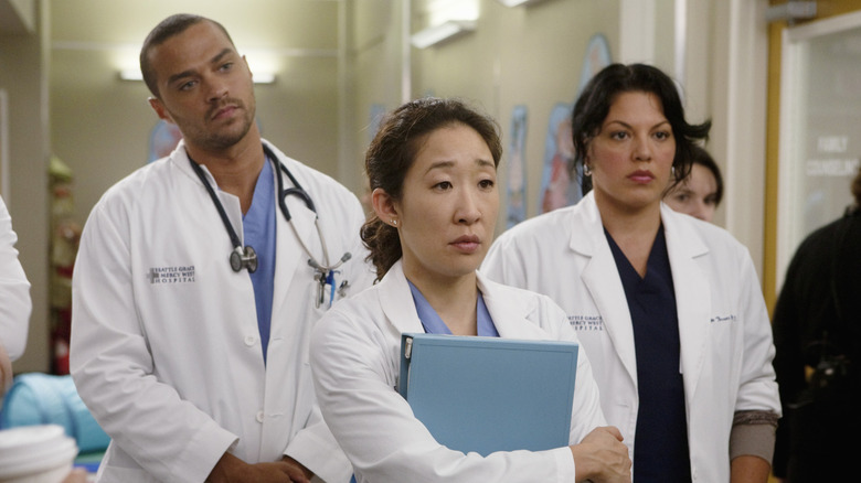 Jackson Avery, Cristina Yang, and Callie Torres standing together on Grey's Anatomy (2008)