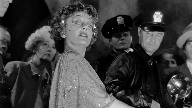 Norma Desmond looking downward