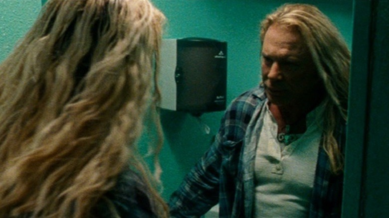 Randy Ramzinski looking in mirror