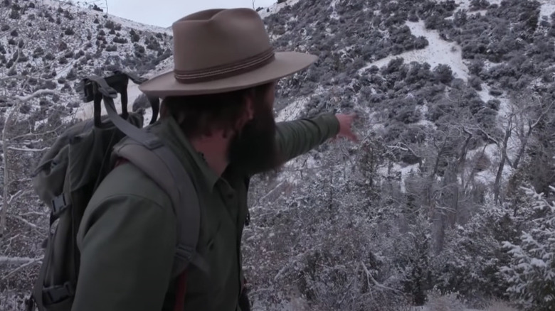 Jake points to a mountain lion
