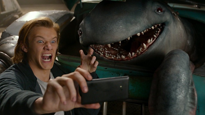Lucas Till with monster