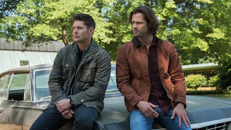 Dean and Sam sitting on Baby