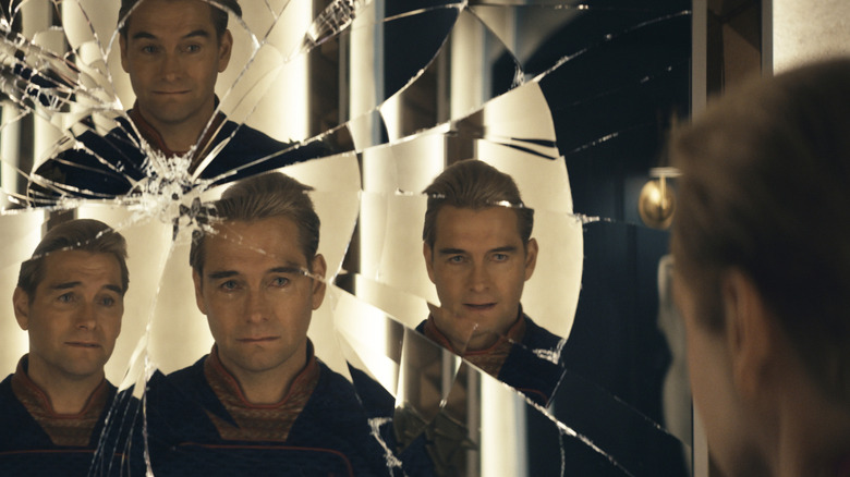 Homelander seeing himself in a splintered mirror with different emotions