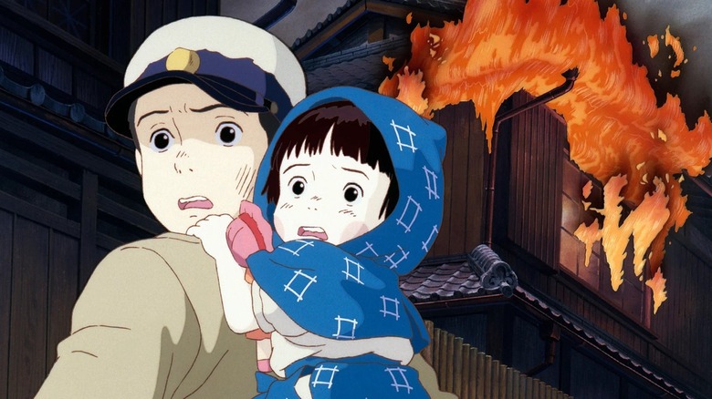 Seita and Setsuko fleeing their home in Grave of the Fireflies (1988)