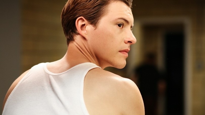 Adam looking over his shoulder in Frankenstein (2015)