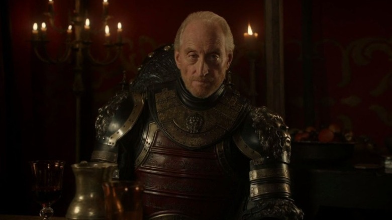 Tywin sitting on the Iron Throne
