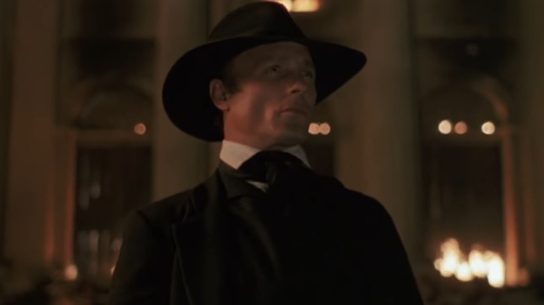 Ed Harris looks into distance