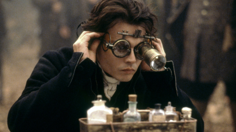 Ichabod Crane studies chemicals in "Sleepy Hollow" (1999)