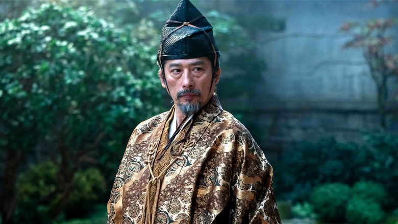 Yoshii Toranaga standing outside looking regal in 