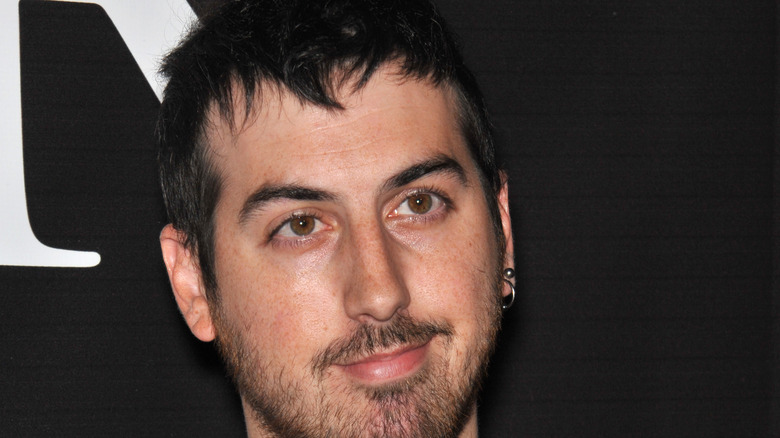 Ti West smiles