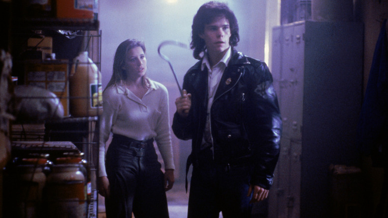 Brian and Megan hide in a supply closet in 'The Blob' (1988)