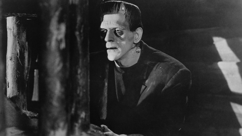 Frankenstein's Monster peeking around corner in "Frankenstein" (1931)