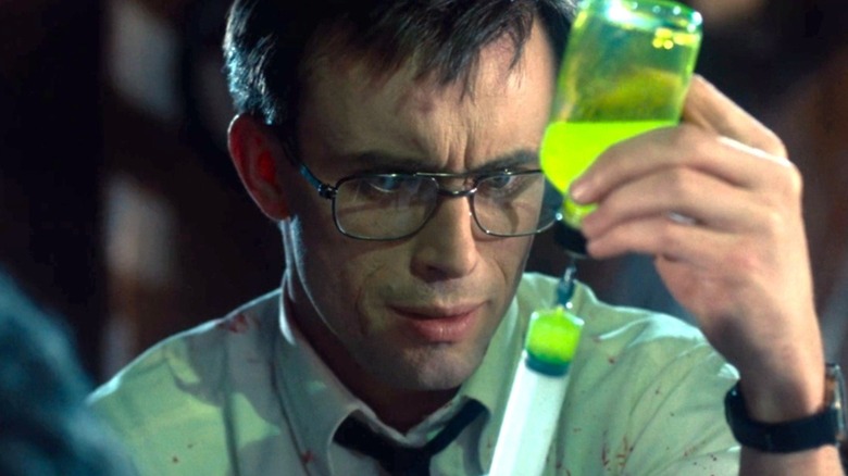 Herbert West prepares his reagent fluid in "Re-Animator" (1985)