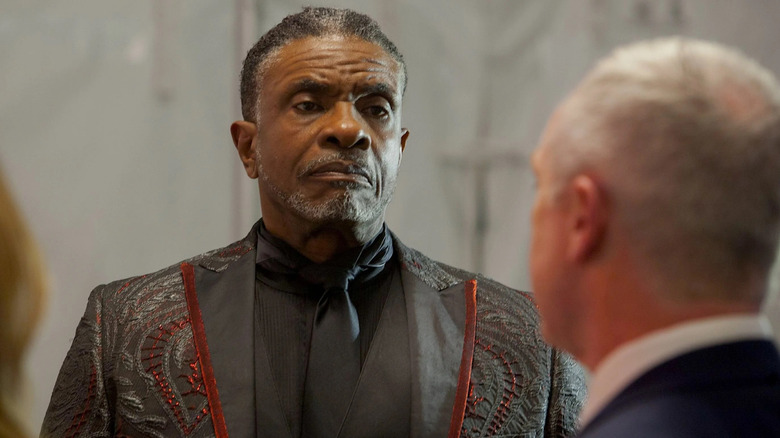 Mr. Simms with a glum expression in "Tales from the Hood 2" (2018)