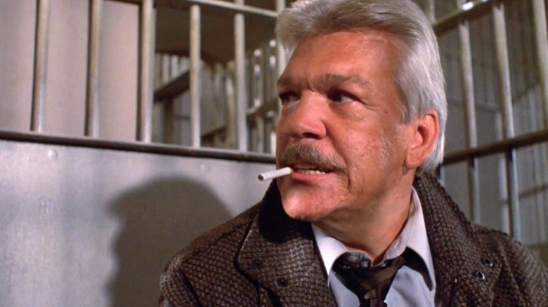 Frank smokes in a jail cell in "Maniac Cop" (1988)