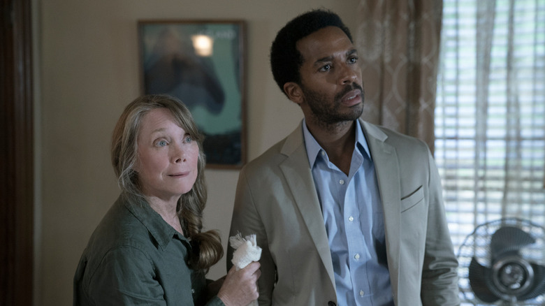 Ruth and Henry Deaver standing together in "Castle Rock" (2018-2019)