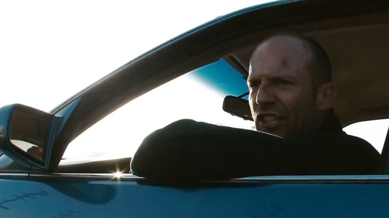 Chelios puts a jumper cable into his mouth in "Crank: High Voltage" (2009)