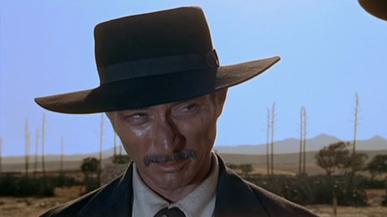 Colonel Douglas Mortimer looking suspiciously in "For a Few Dollars More"