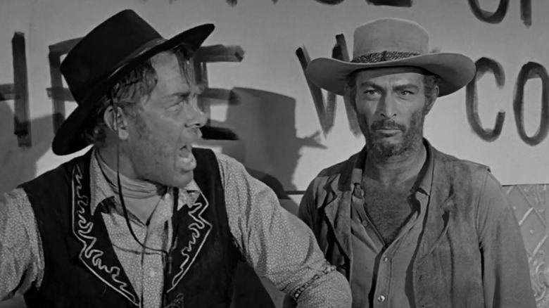 Floyd standing beside the furious Liberty Valance in "The Man Who Shot Liberty Valance"