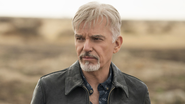 Billy McBride frowning in "Goliath."