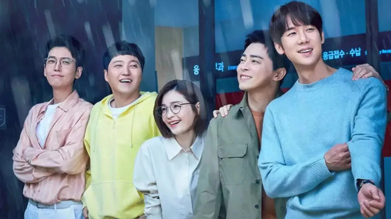 The gang of doctors look out of the hospital window in "Hospital Playlist"