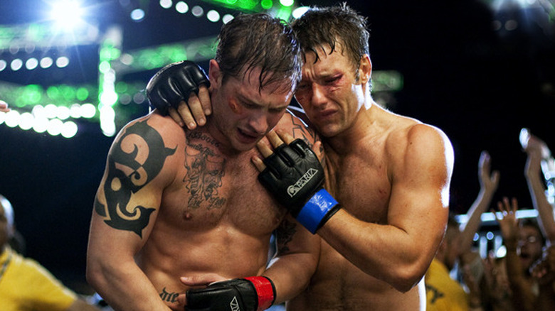 Tommy and embrace after a fight in "Warrior"