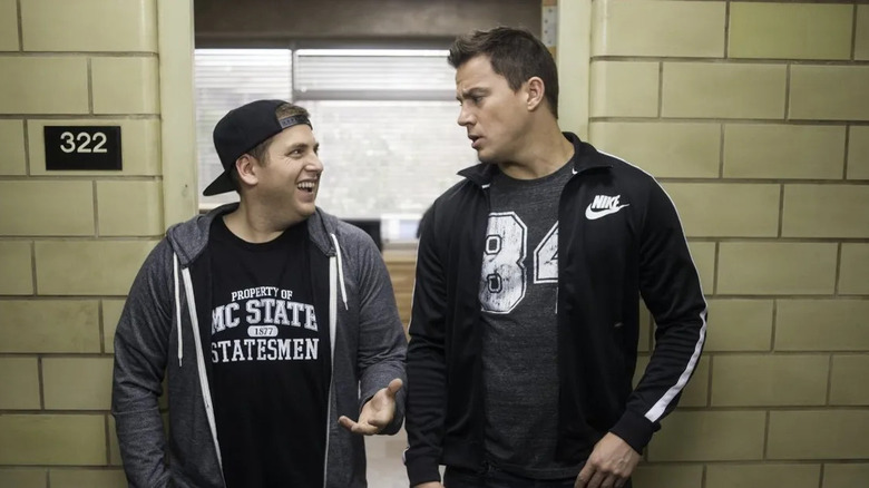 Schmidt and Jenko in their dorm hallway talking in 22 Jump Street